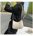 Stay Stylish and Organized with Our Large Capacity Underarm Shoulder Bag Lady Casual PU Leather