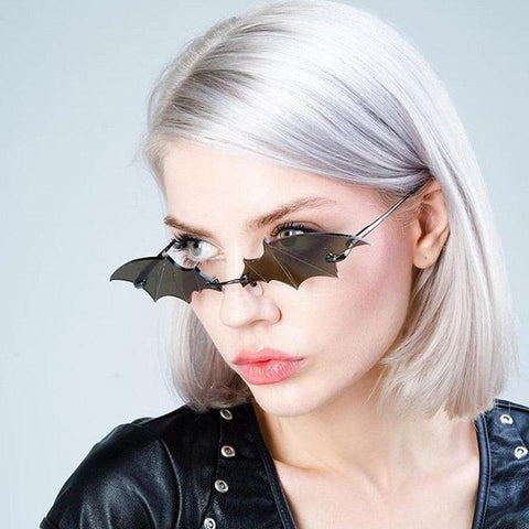 Unleash Your Inner Bat with Fashionable Rimless Bat-Shaped Sunglasses