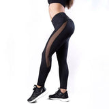 High-Waisted Femme Fitness Leggings - Solid Color with Mesh and PU Leather Patchwork Design