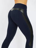 High-Waisted Femme Fitness Leggings - Solid Color with Mesh and PU Leather Patchwork Design